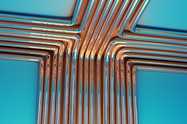 Copper pipes forming a cross shape representing water line installation