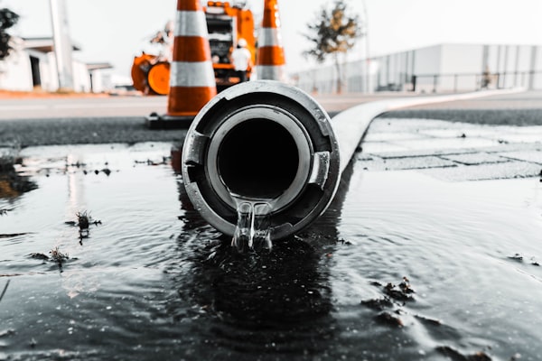 Water flowing from a pipe showing leak detection scenario